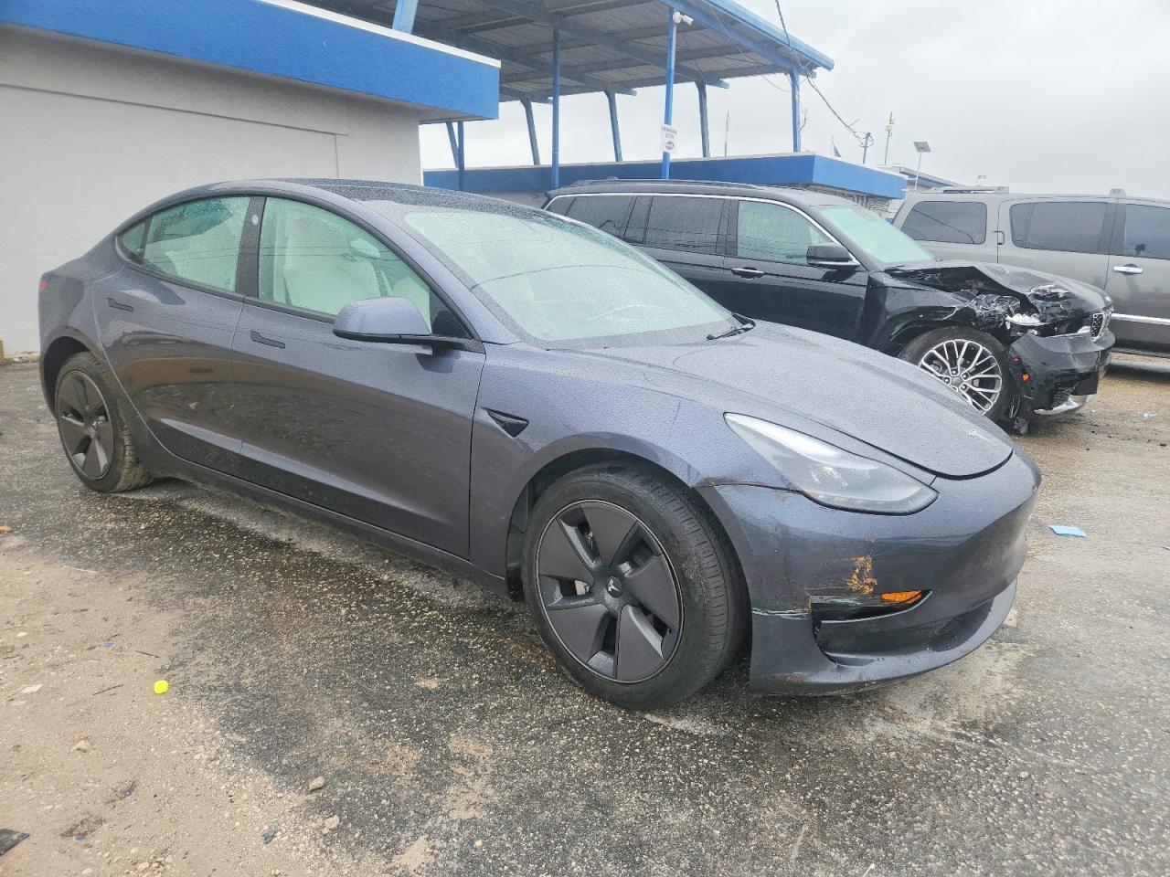 2023 Tesla Model 3 - Фото 4