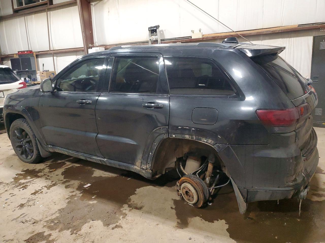 2015 Jeep Grand Cherokee Summi - Фото 2