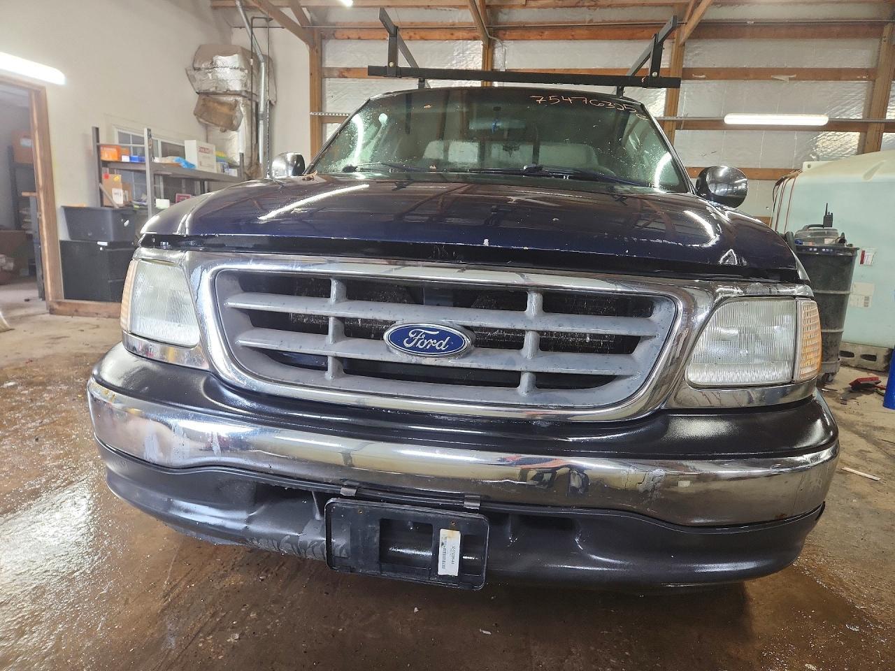 2002 Ford F150 - Фото 5
