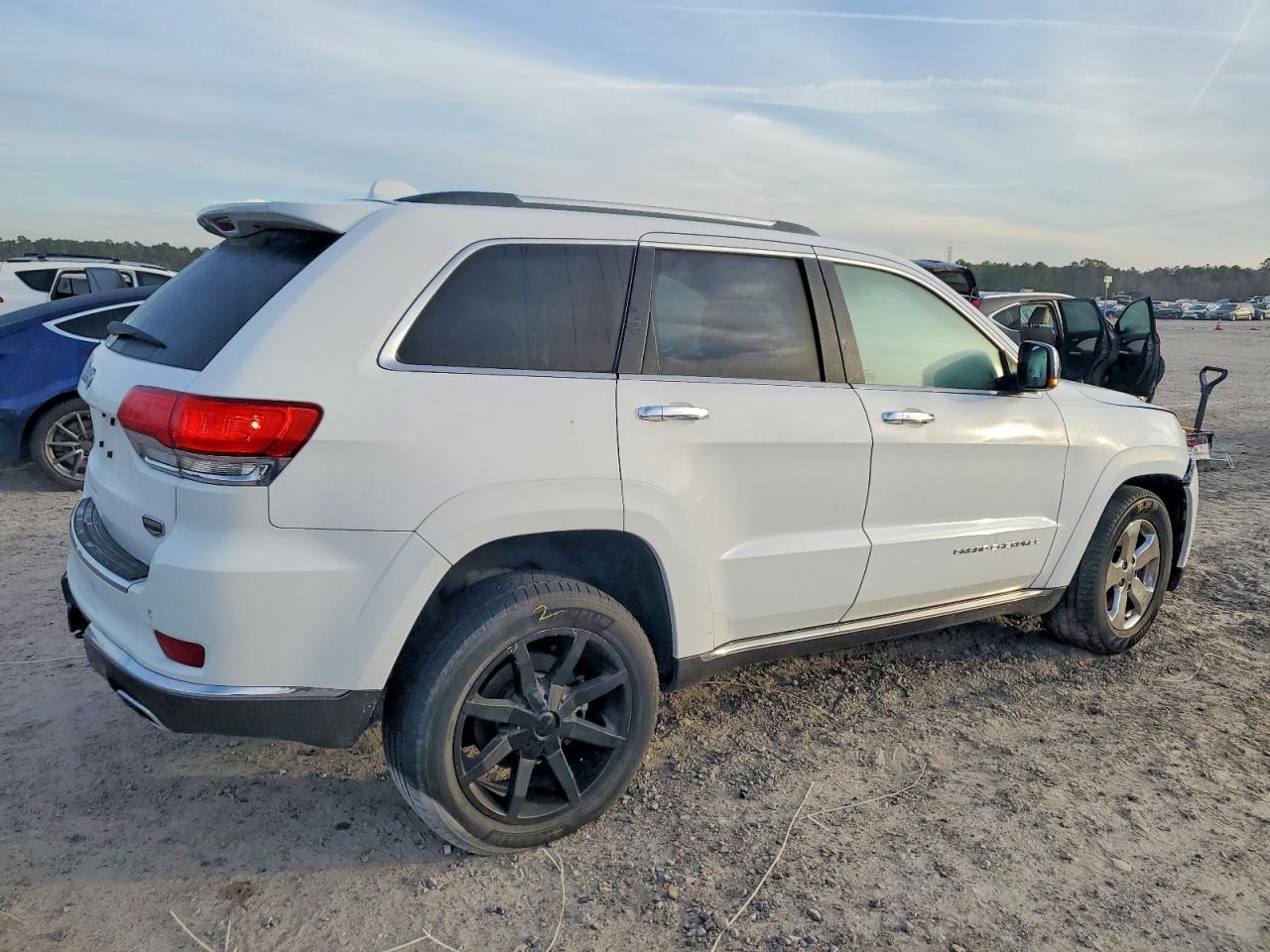 2014 Jeep Grand Cherokee Summit - Фото 3