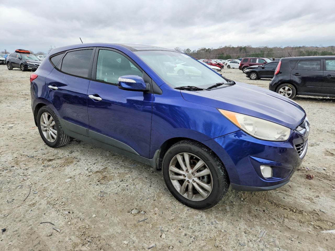 2012 Hyundai Tuscan - Image 4