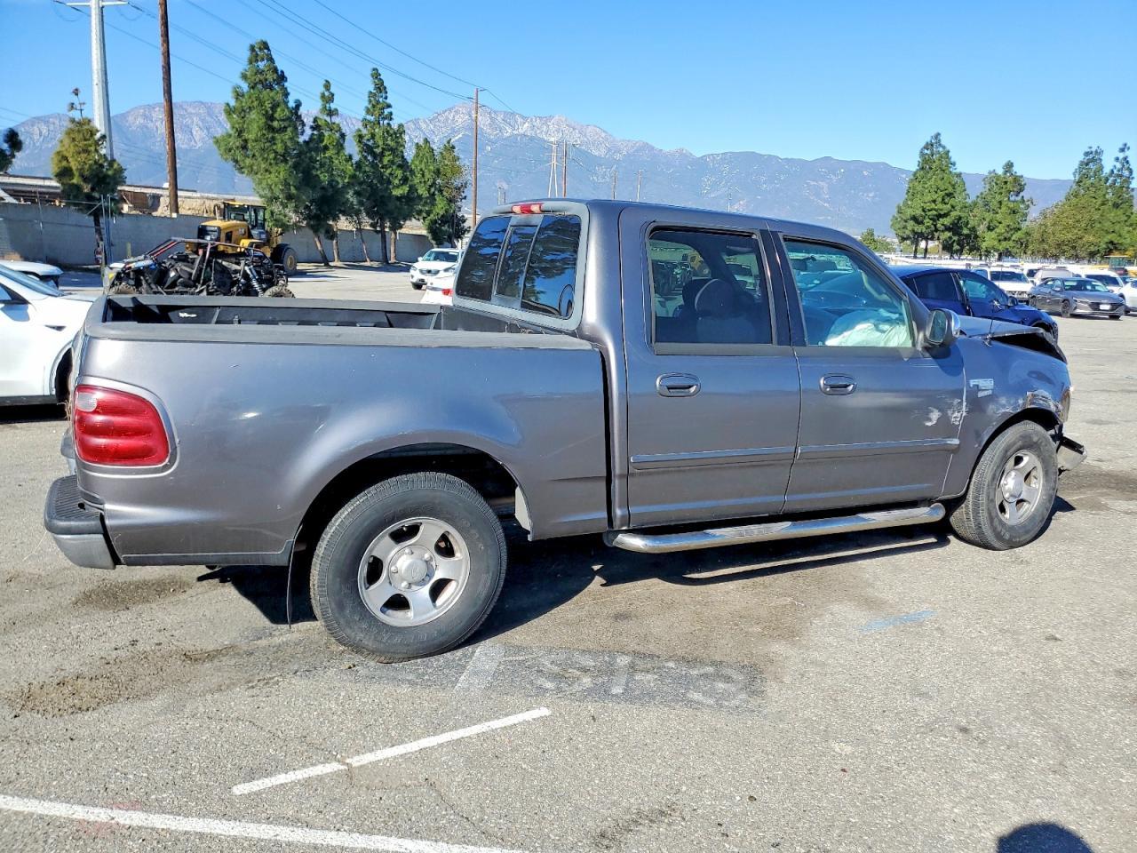 2002 Ford F150 Supercrew - Фото 3