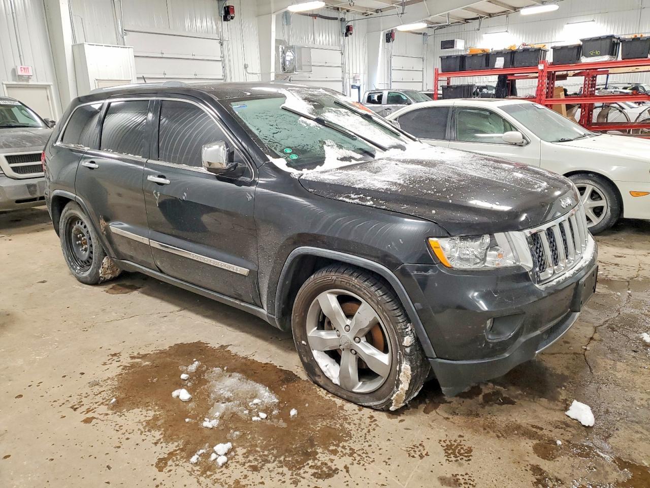 2012 Jeep Grand Cherokee Overland - Фото 4