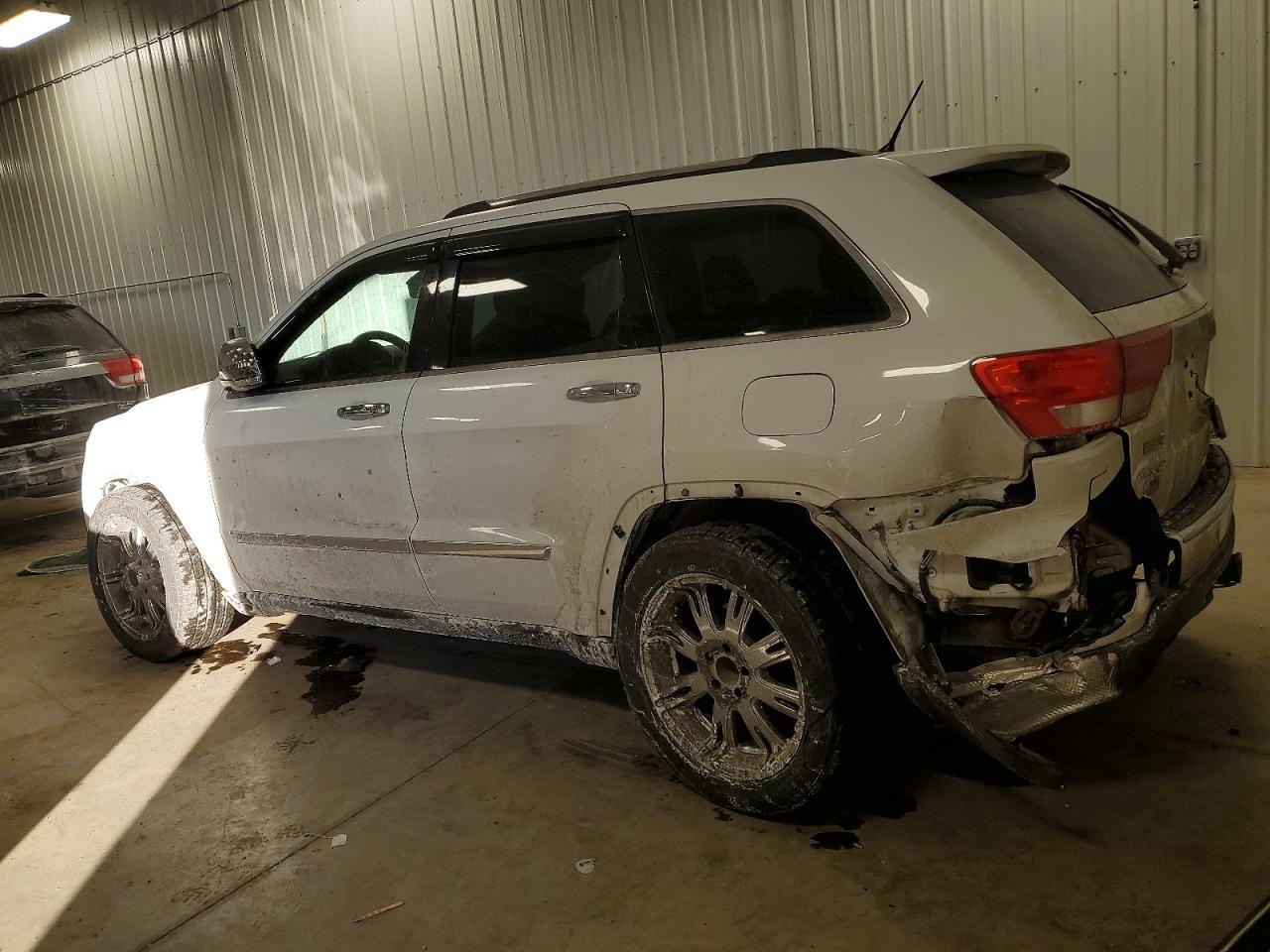 2013 Jeep Grand Cherokee Overland - Фото 2
