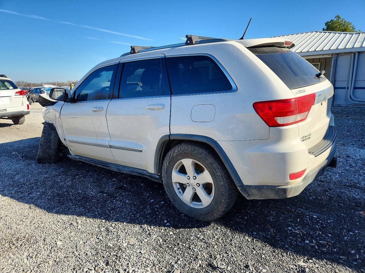 2011 Jeep Grand Cherokee Laredo - Фото 2