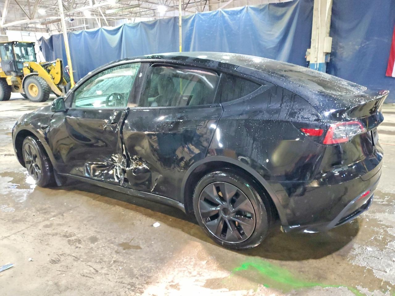 2024 Tesla Model Y - Фото 2