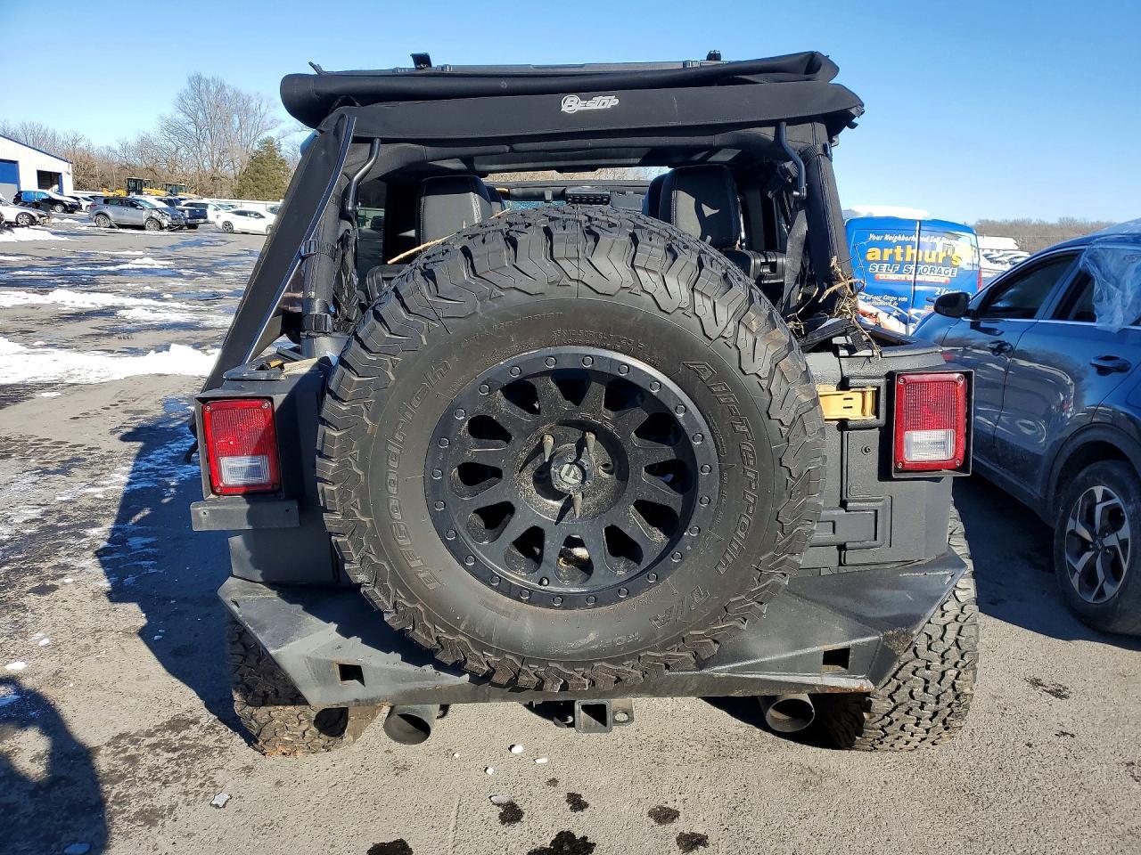2014 Jeep Wrangler Unlimited Sahara - Фото 6