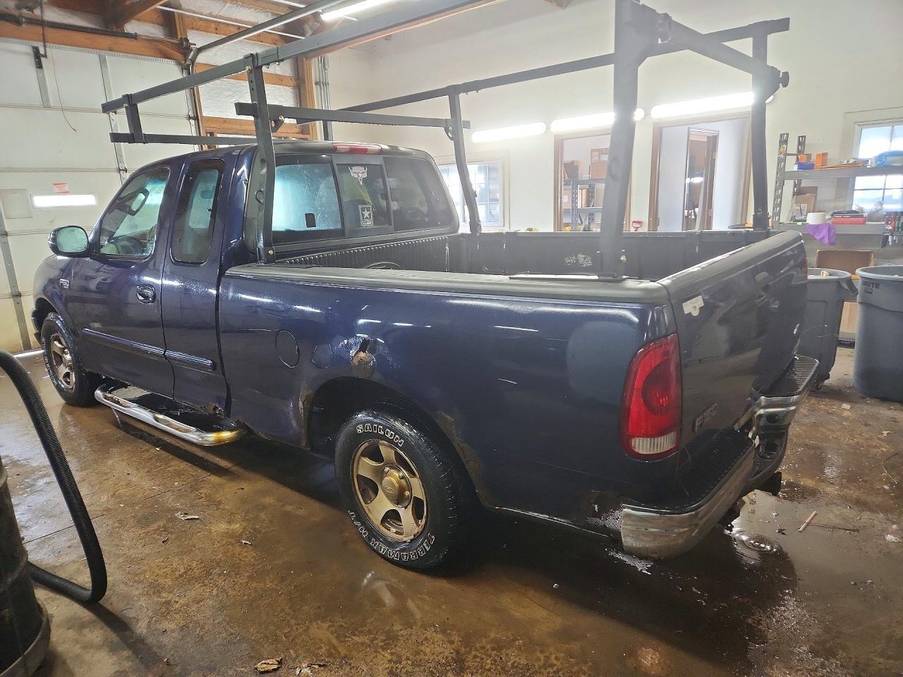 2002 Ford F150 - Фото 2