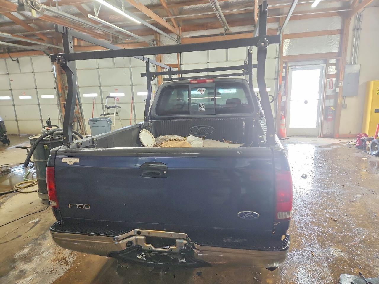 2002 Ford F150 - Фото 6