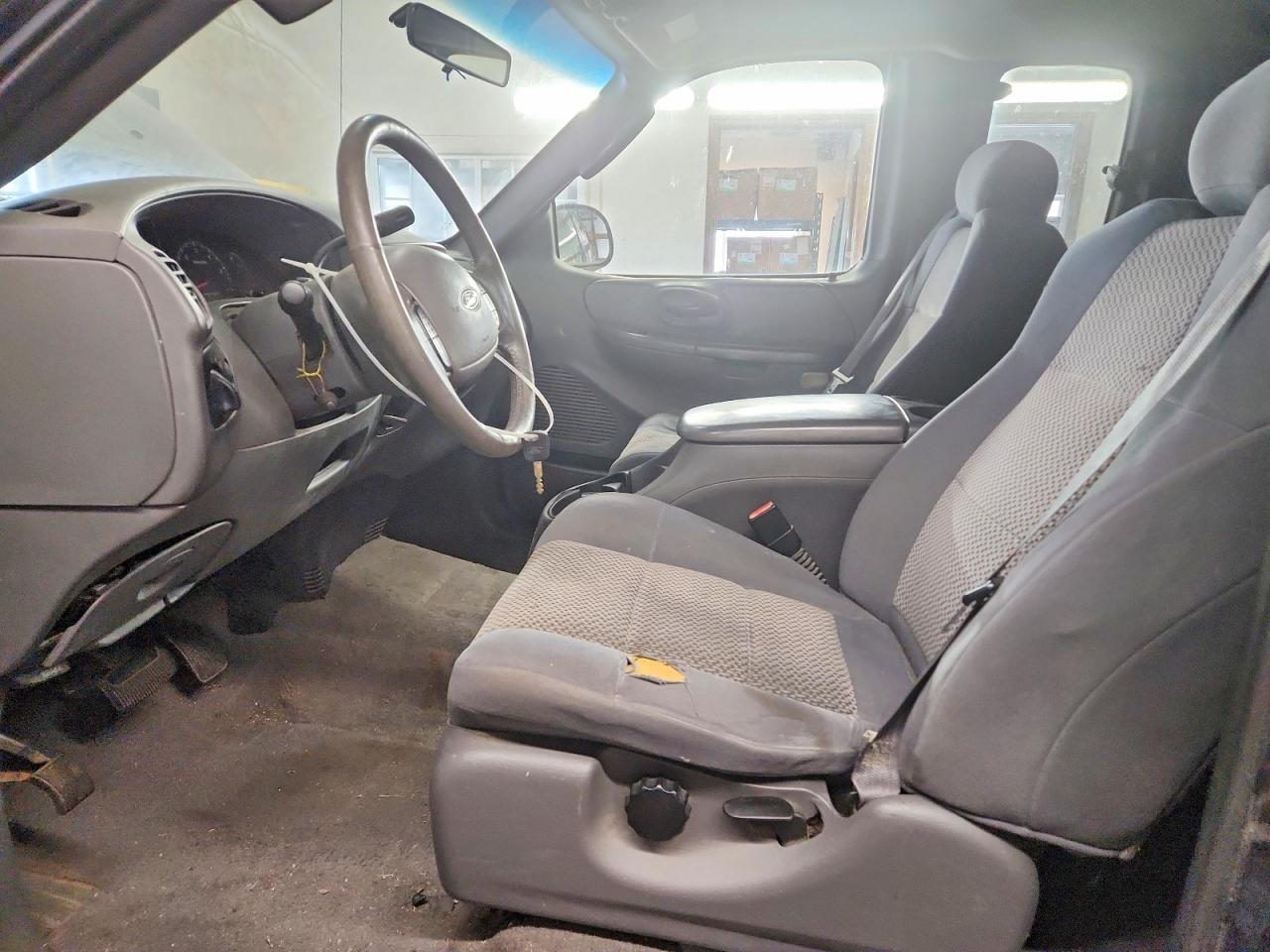 2002 Ford F150 - Фото 7