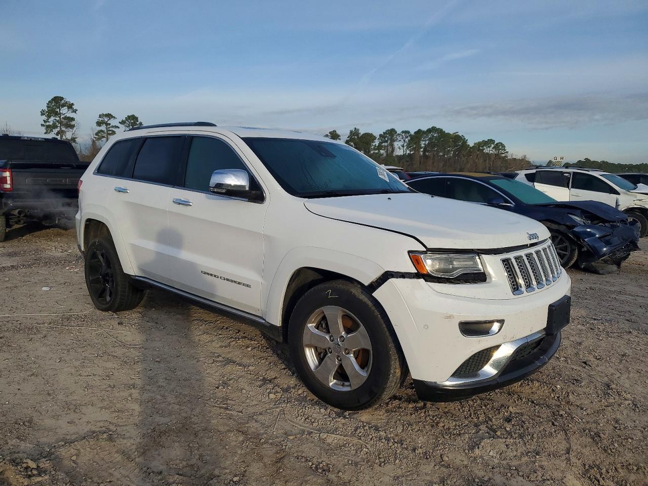 2014 Jeep Grand Cherokee Summit - Фото 4