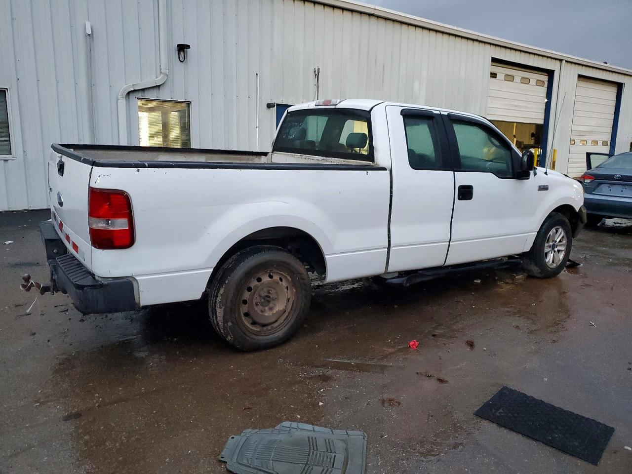 2005 Ford F150 - Фото 3