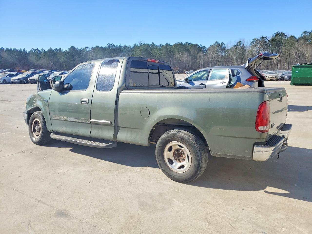 2003 Ford F150 - Фото 2