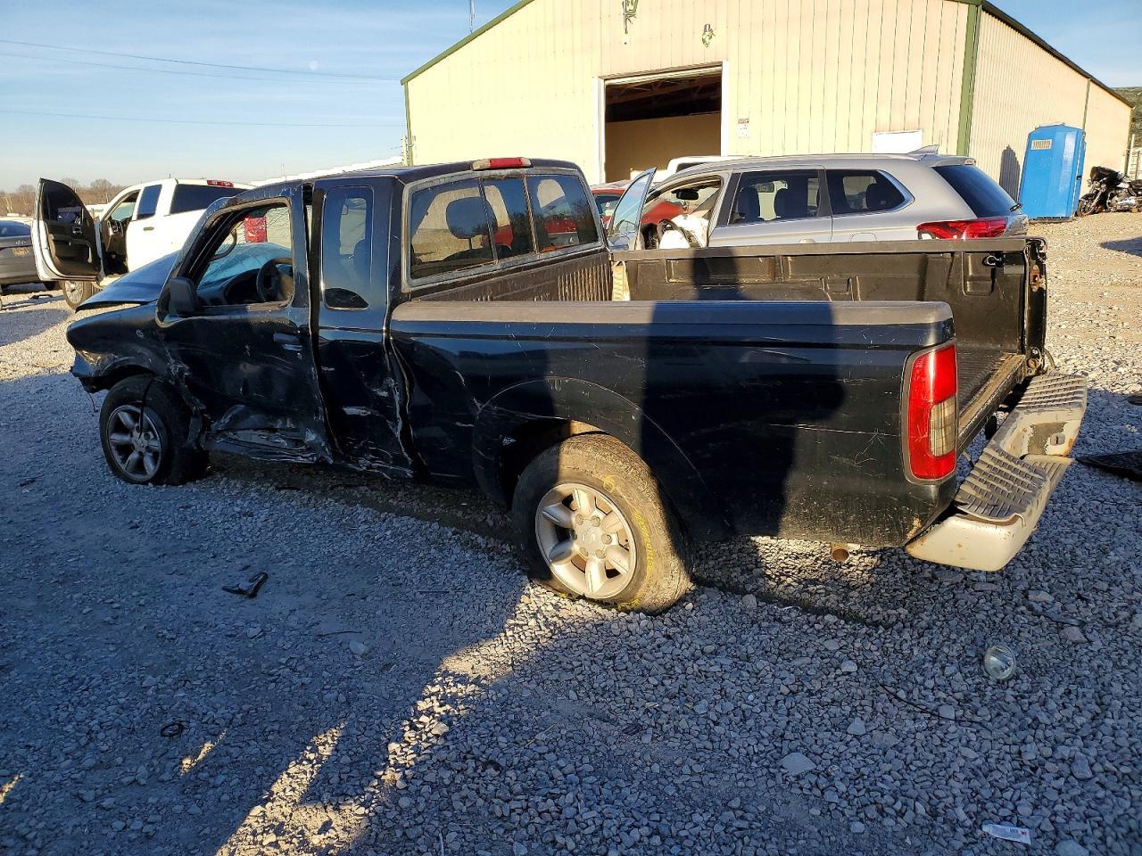 2003 Nissan Frontier King Cab Xe - Фото 2