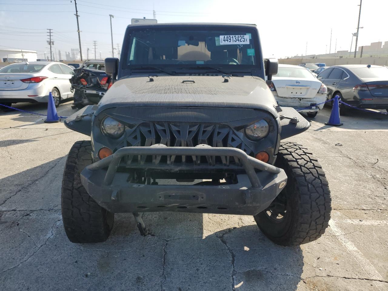 2010 Jeep Wrangler Unlimited Sport - Фото 5