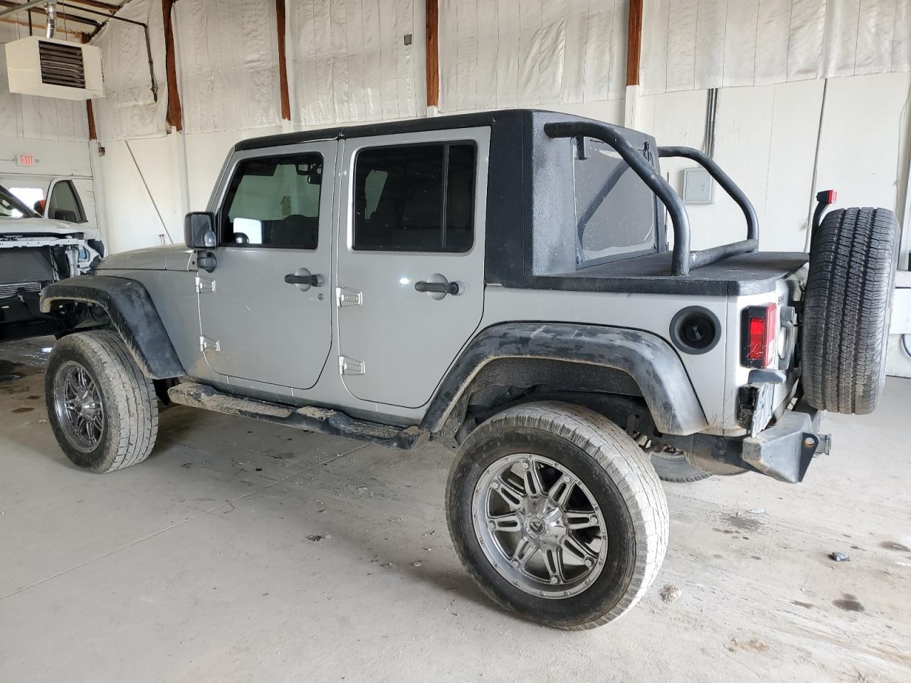 2012 Jeep Wrangler Unlimited Sport - Фото 2