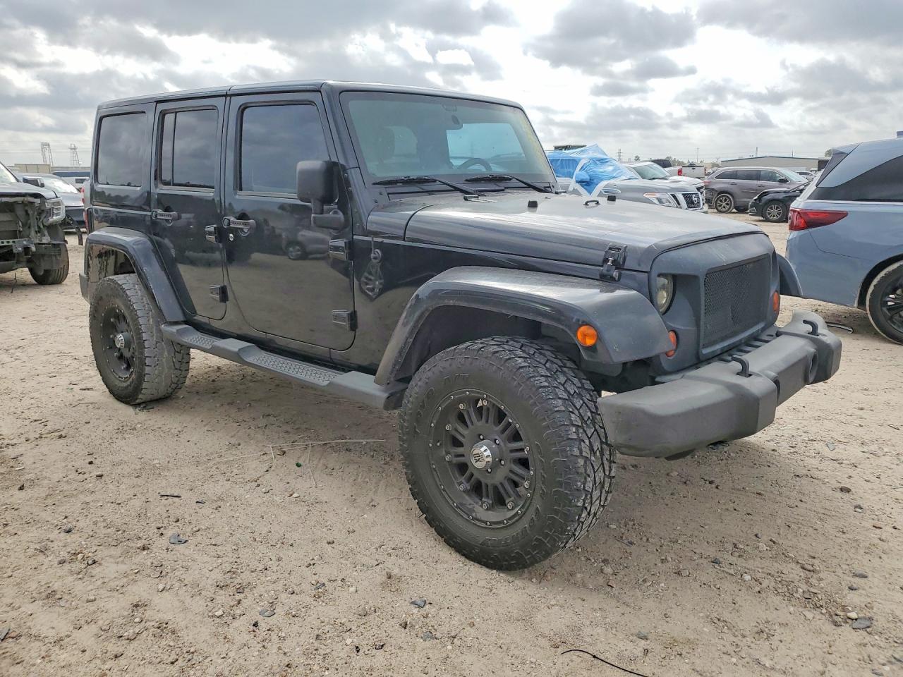 2012 Jeep Wrangler Unlimited Sahara - Фото 4