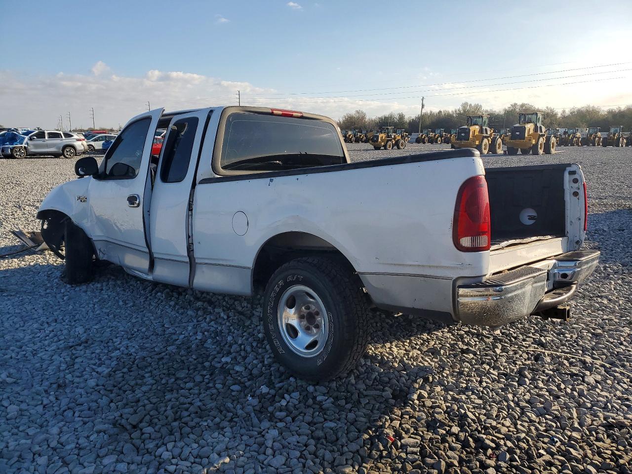 2002 Ford F150 - Фото 2
