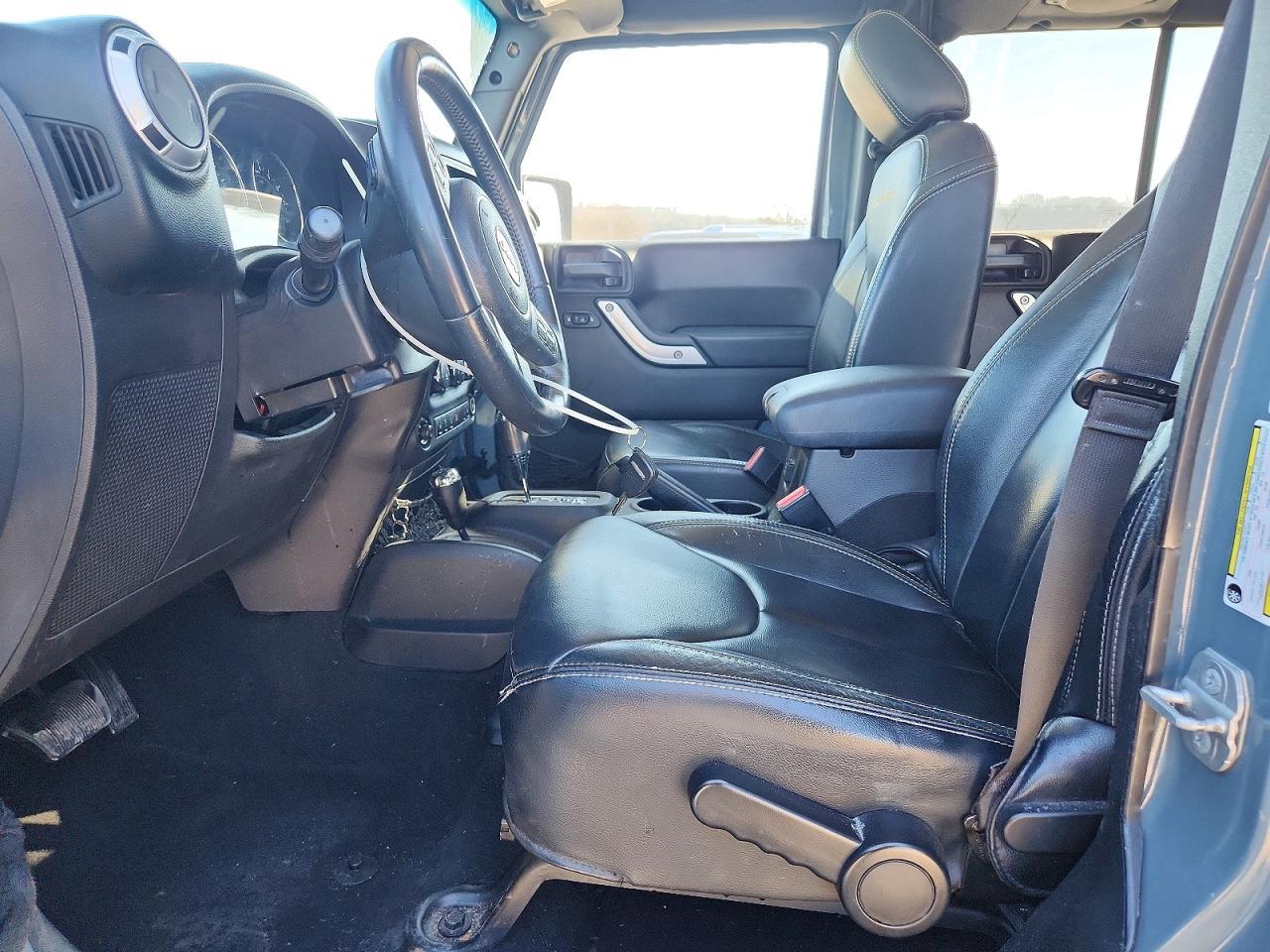 2014 Jeep Wrangler Unlimited Sahara - Фото 7