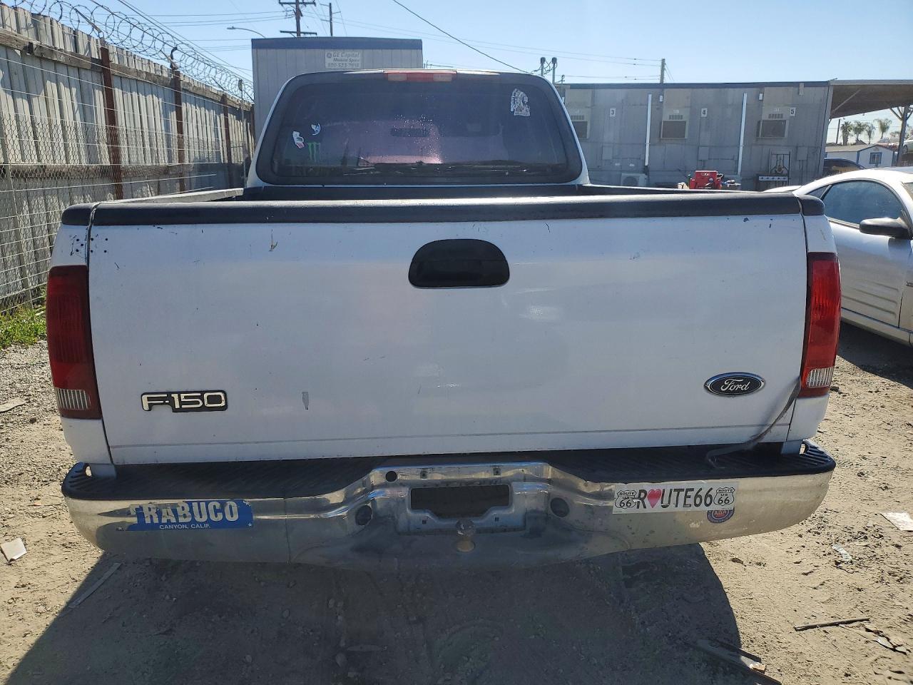 2003 Ford F150 - Фото 6