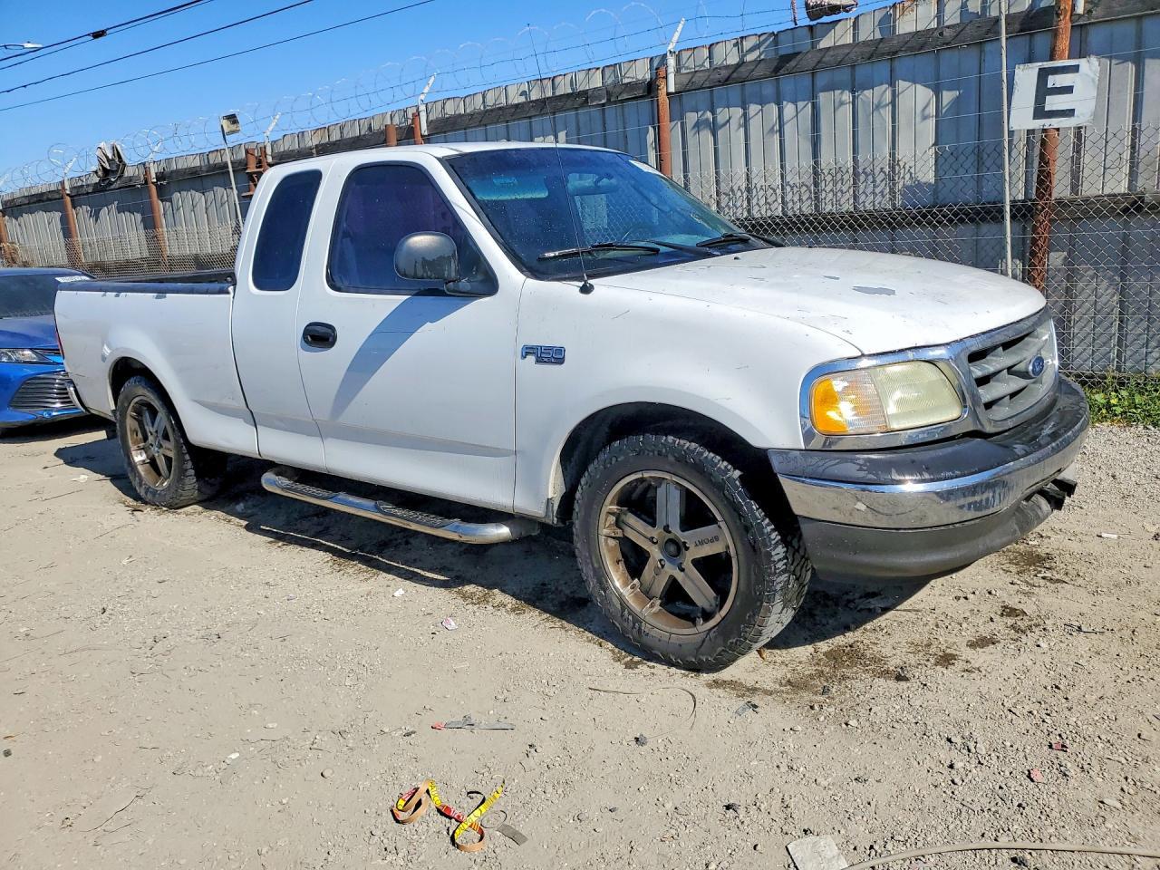 2003 Ford F150 - Фото 4