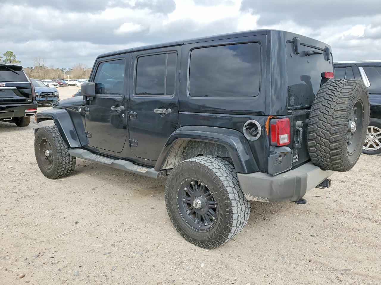 2012 Jeep Wrangler Unlimited Sahara - Фото 2
