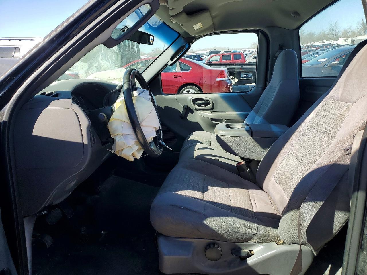 2003 Ford F150 - Фото 7