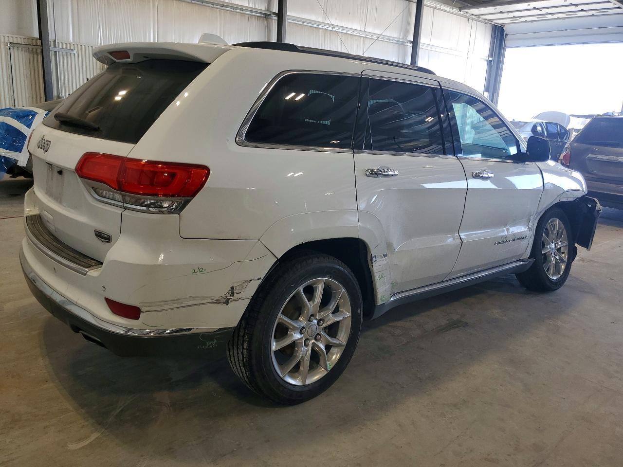 2014 Jeep Grand Cherokee Summit - Фото 3