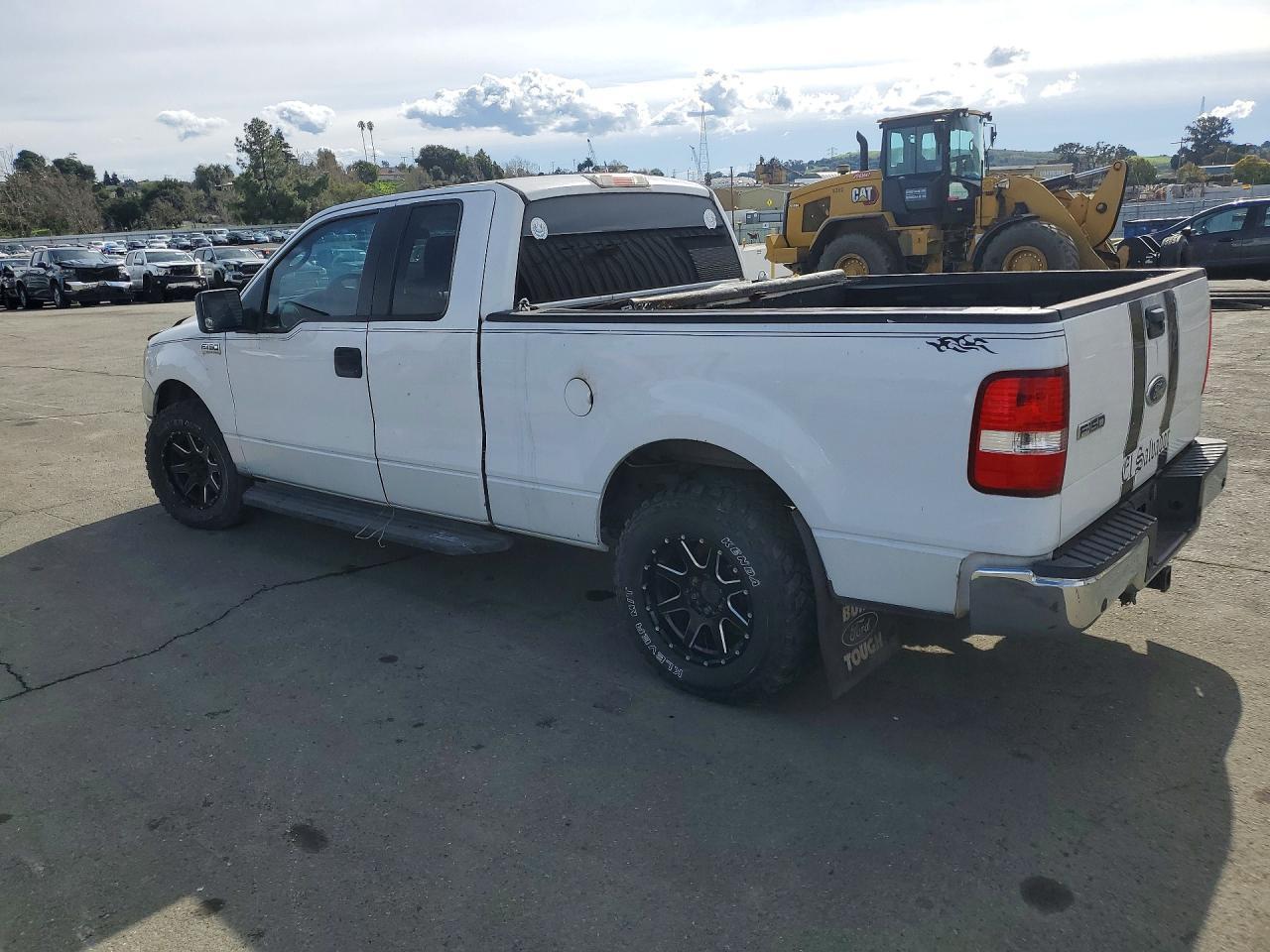 2005 Ford F150 - Фото 2