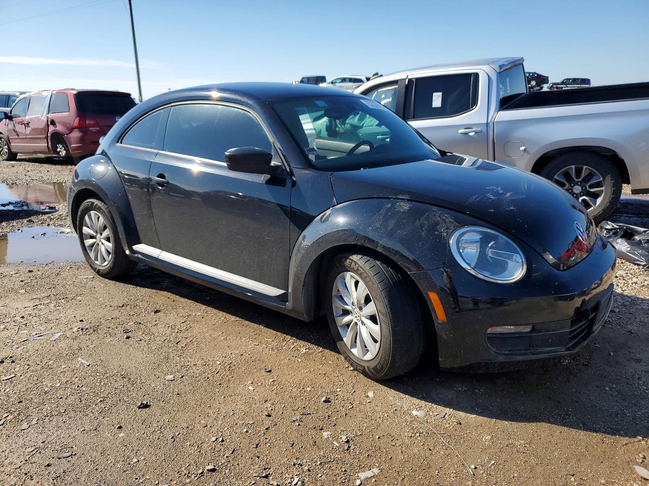 2016 Volkswagen Beetle 1.8T - Фото 4