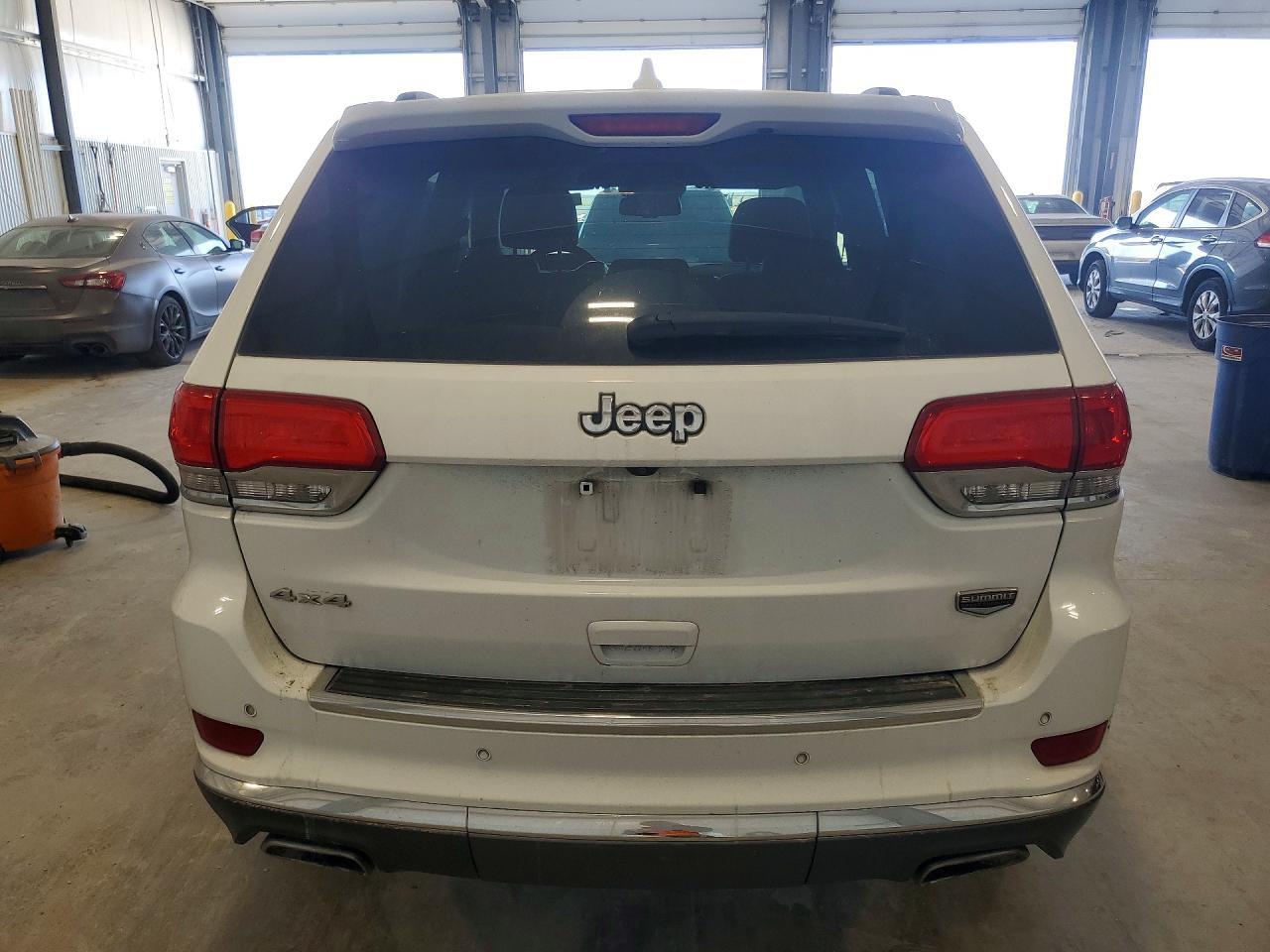 2014 Jeep Grand Cherokee Summit - Фото 6