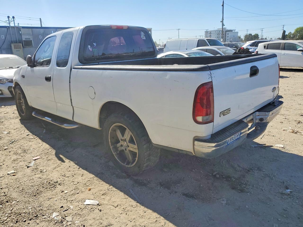 2003 Ford F150 - Фото 2