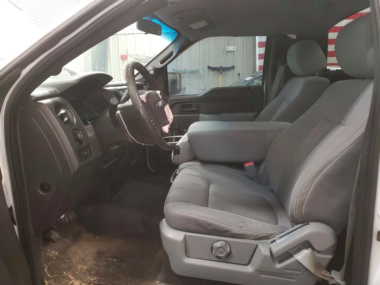 2014 Ford F150 - Фото 7