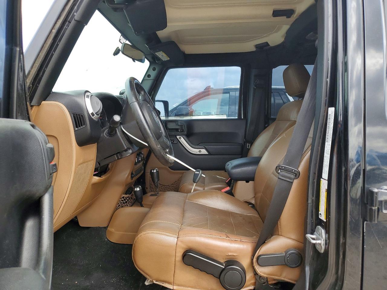 2012 Jeep Wrangler Unlimited Sahara - Фото 7