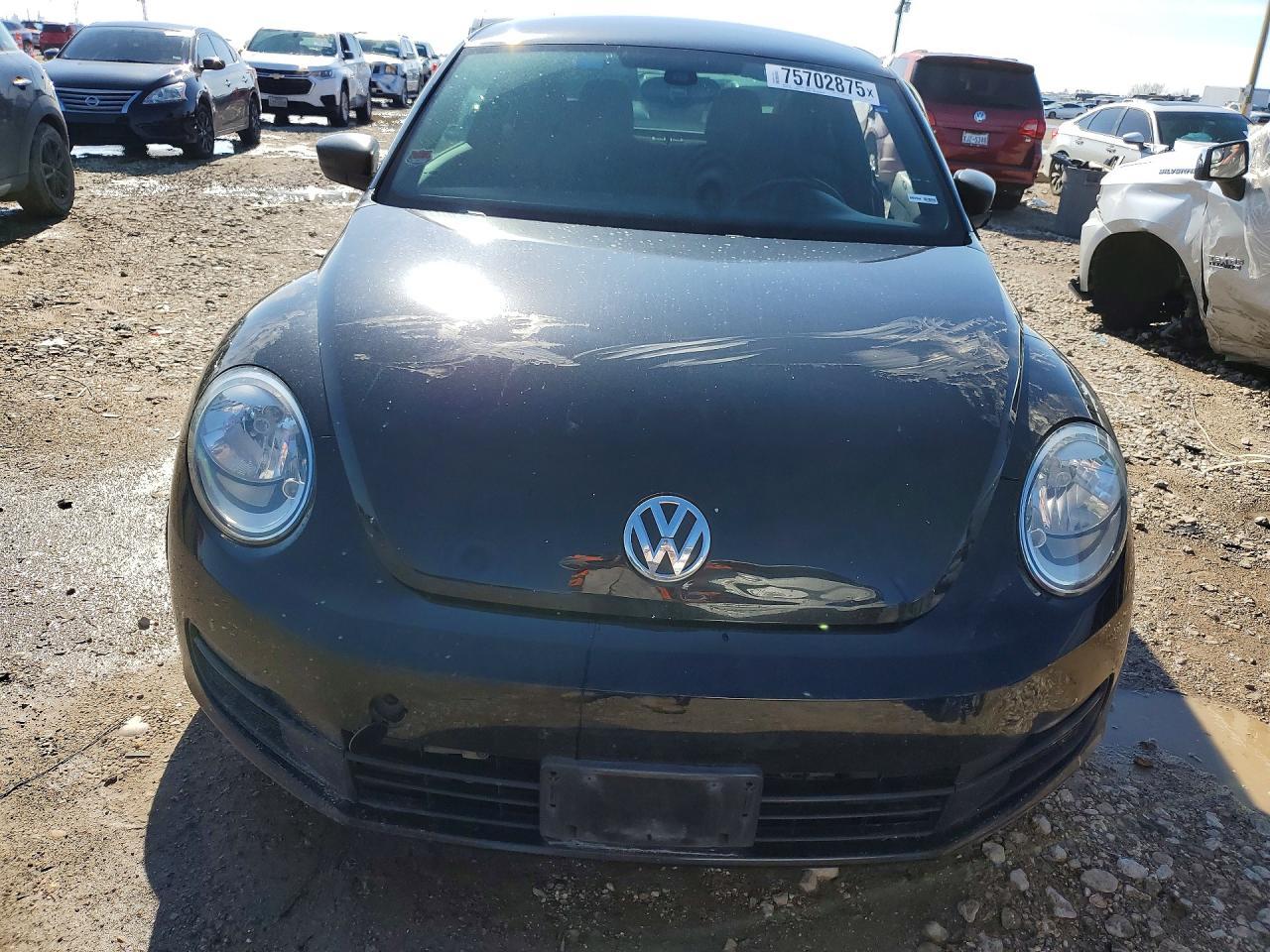 2016 Volkswagen Beetle 1.8T - Фото 5