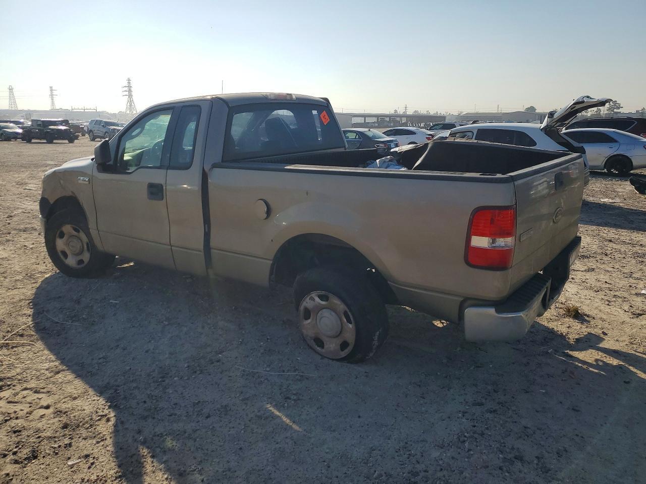 2005 Ford F150 - Фото 2