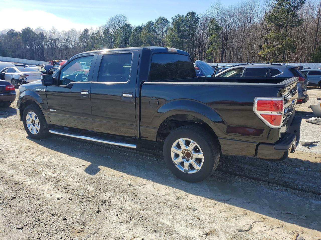 2011 Ford F150 Super Cab - Image 2