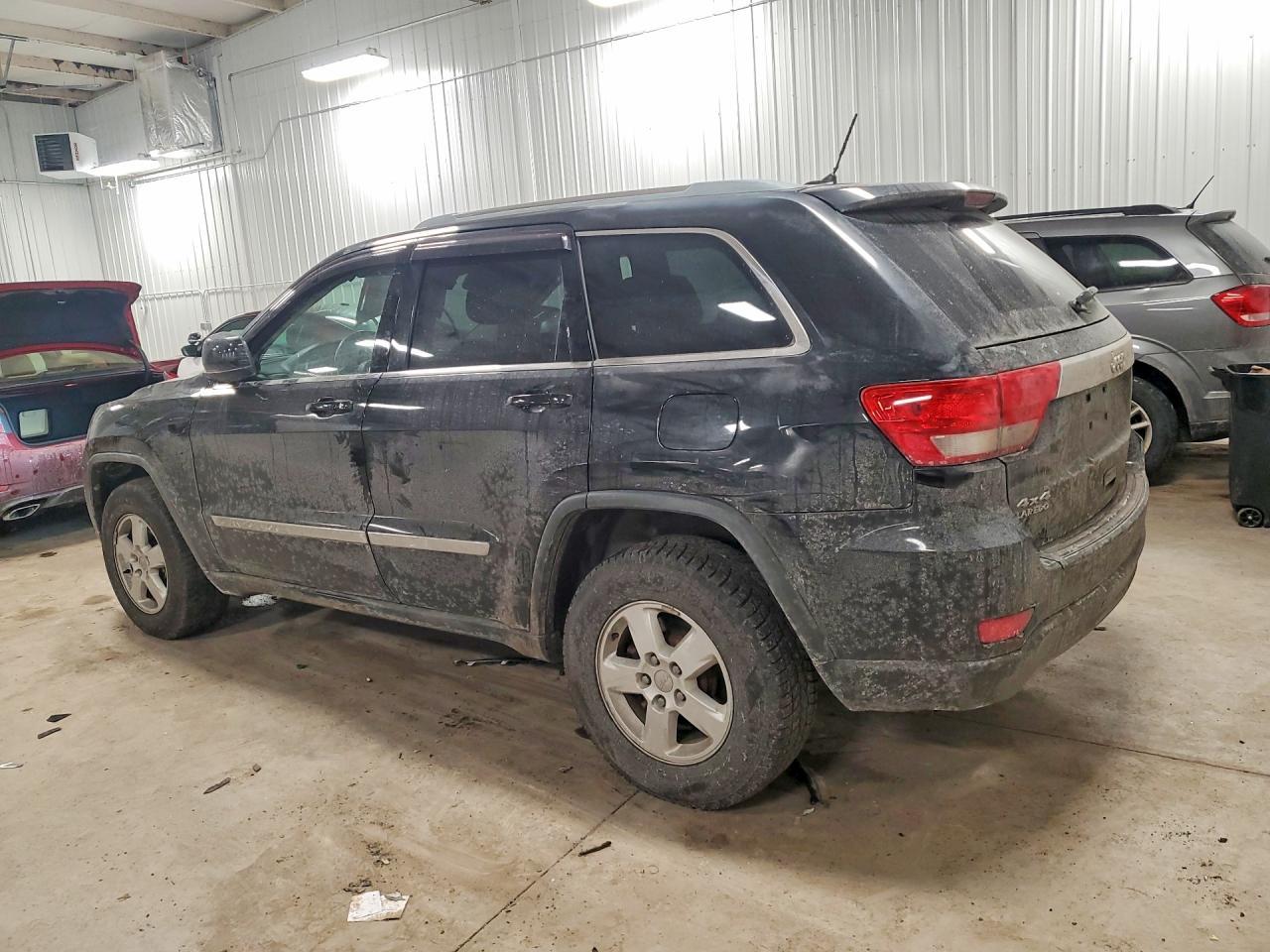 2011 Jeep Grand Cherokee Laredo - Фото 2