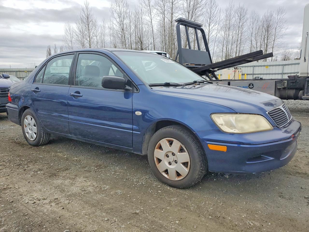 2002 Mitsubishi Lancer Es - Фото 4