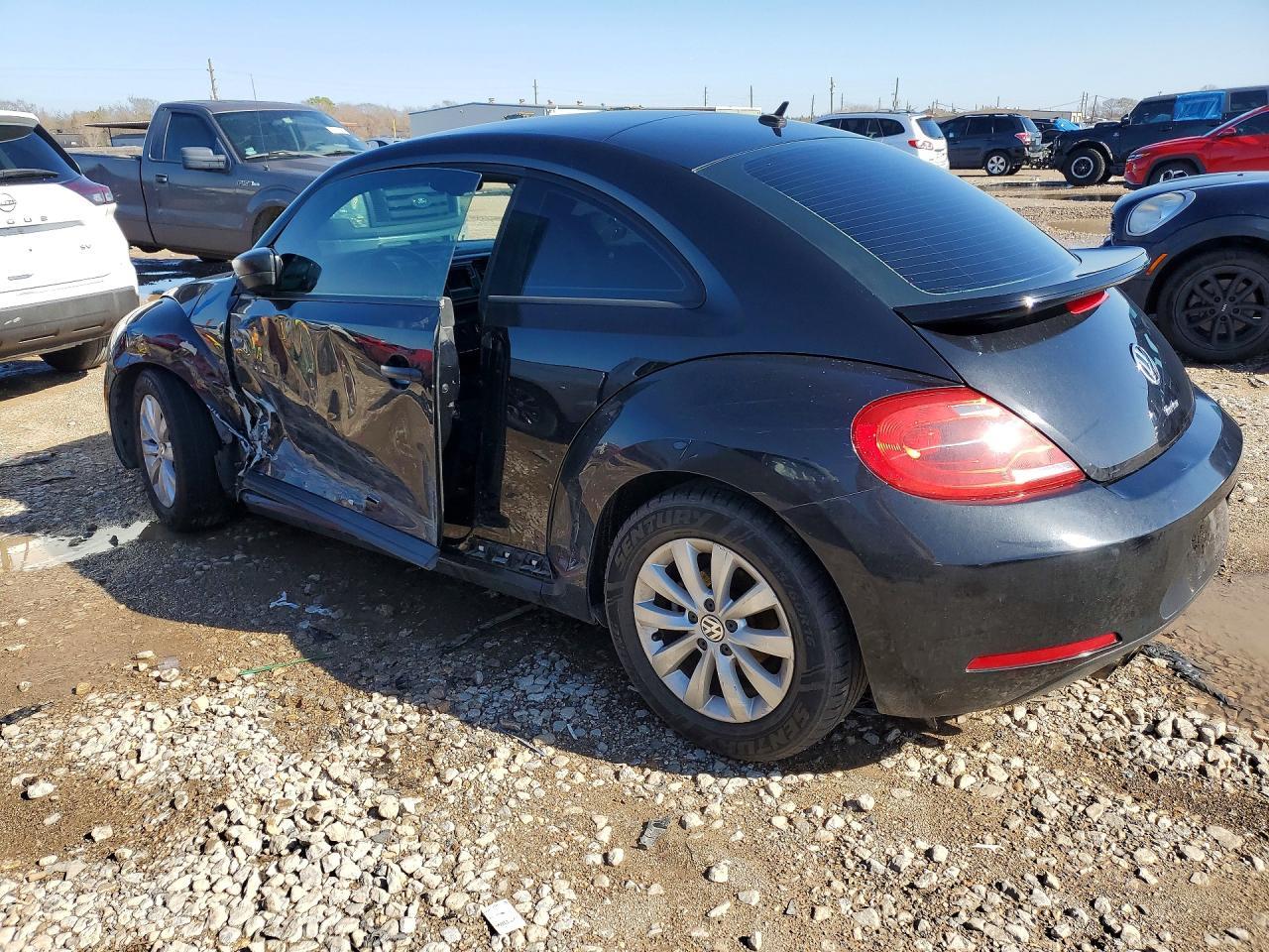 2016 Volkswagen Beetle 1.8T - Фото 2
