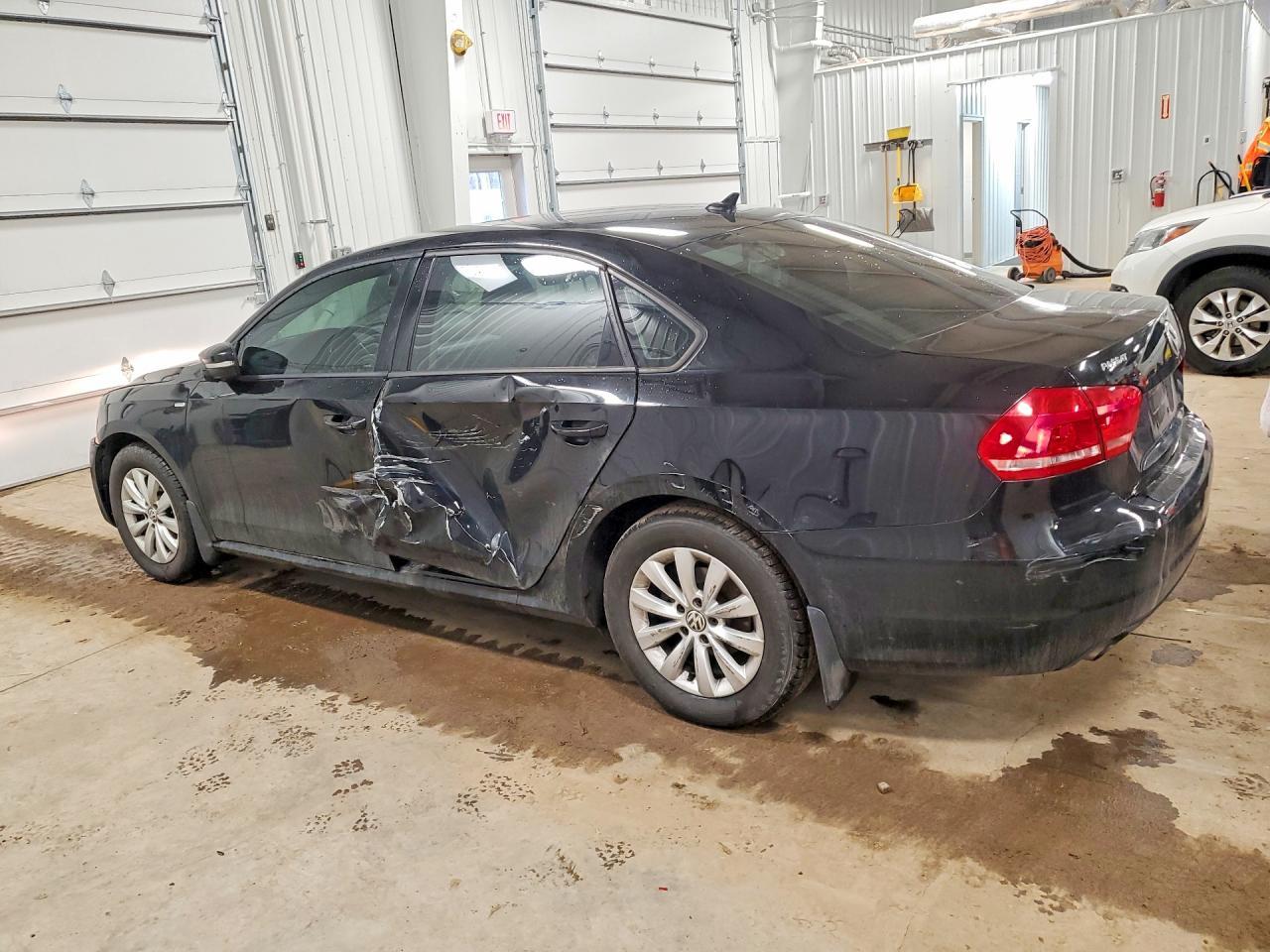 2014 Volkswagen Passat - Фото 2