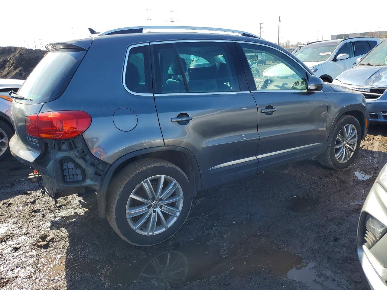 2014 Volkswagen Tiguan S - Фото 3