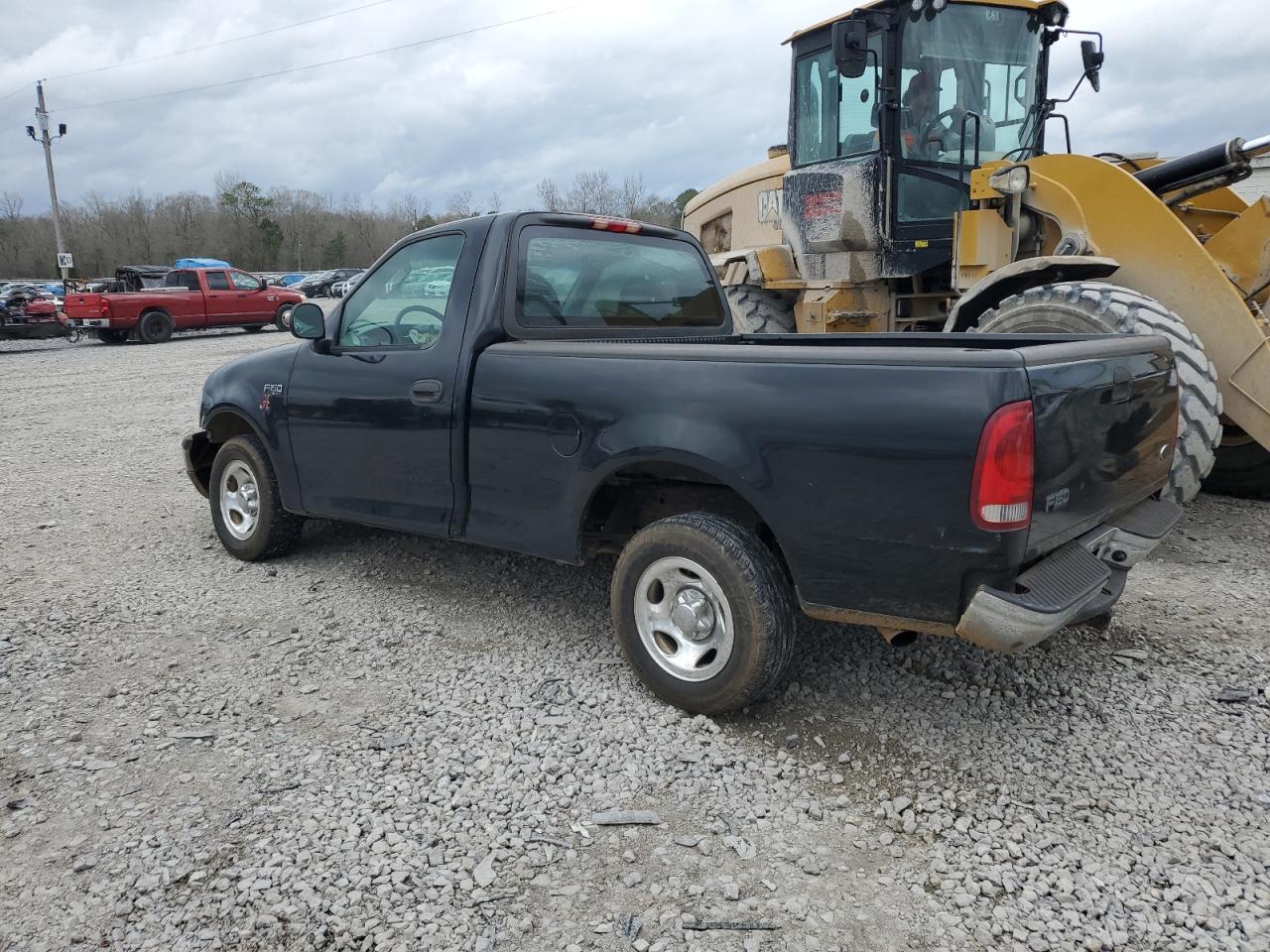 2003 Ford F150 - Фото 2