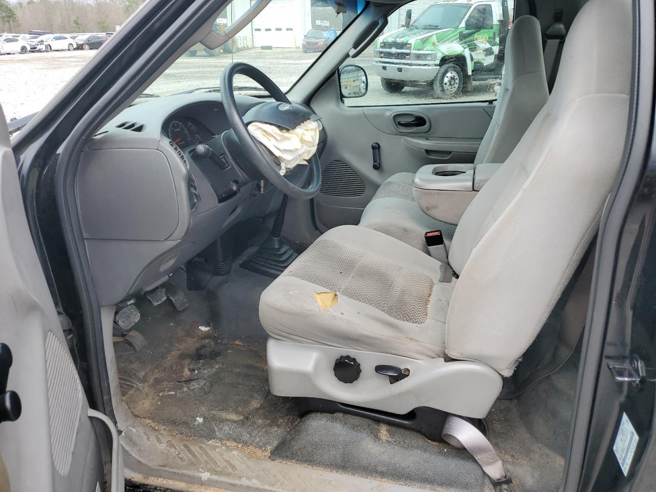 2003 Ford F150 - Фото 7