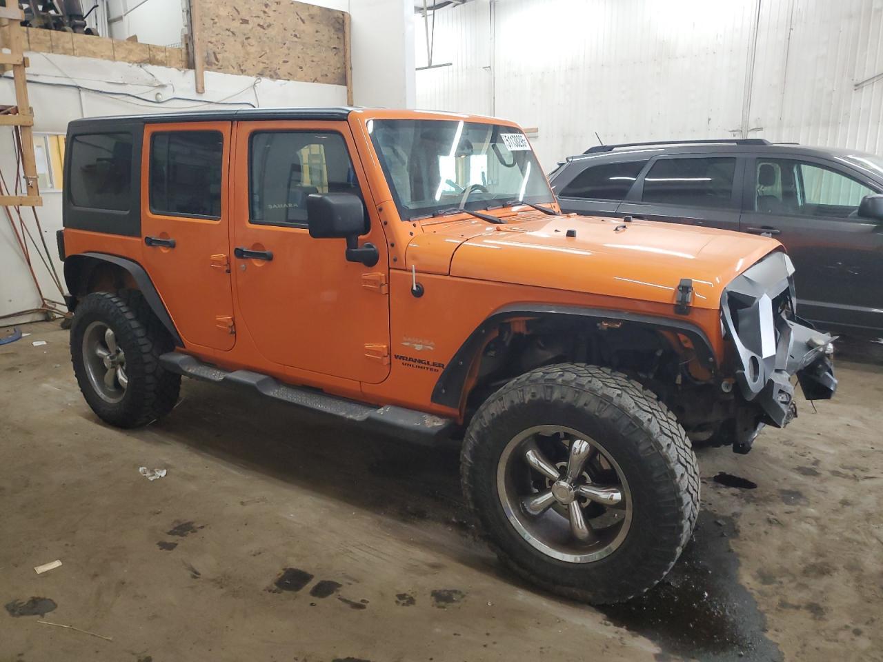 2013 Jeep Wrangler Unlimited Sahara - Фото 4