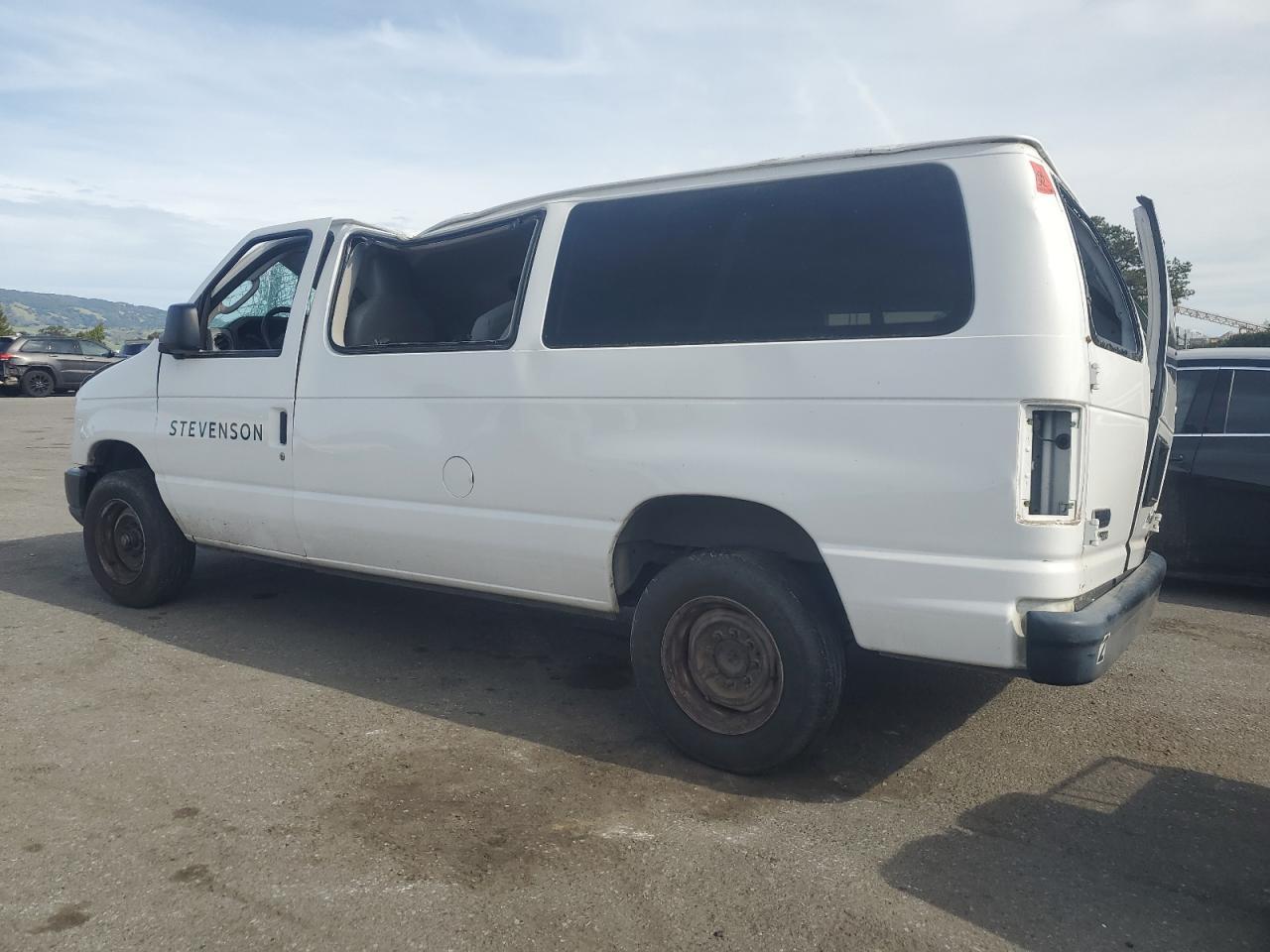 2011 Ford Econoline E150 Wagon - Image 2