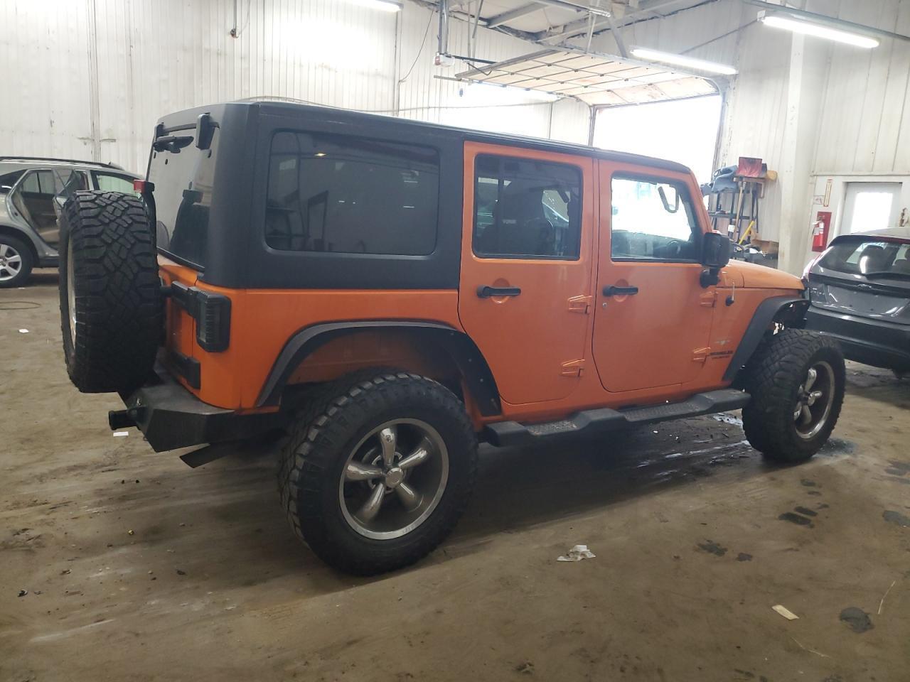 2013 Jeep Wrangler Unlimited Sahara - Фото 3