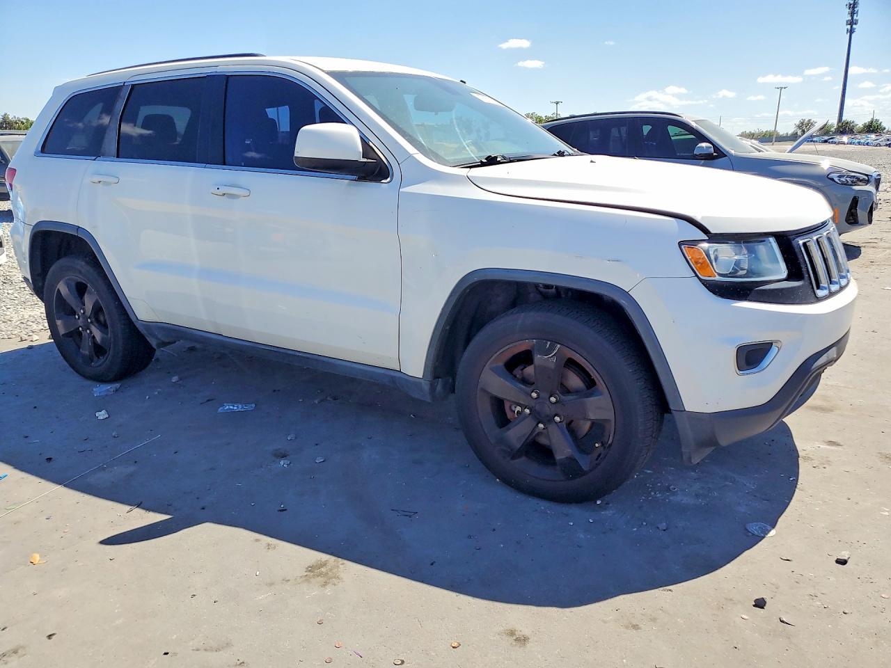 2014 Jeep Grand Cherokee 4Xe - Фото 4