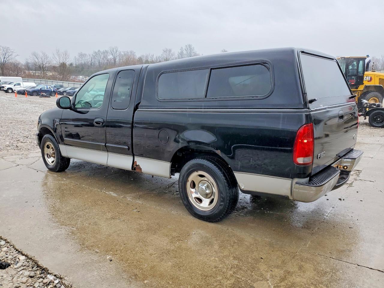 2003 Ford F150 - Фото 2