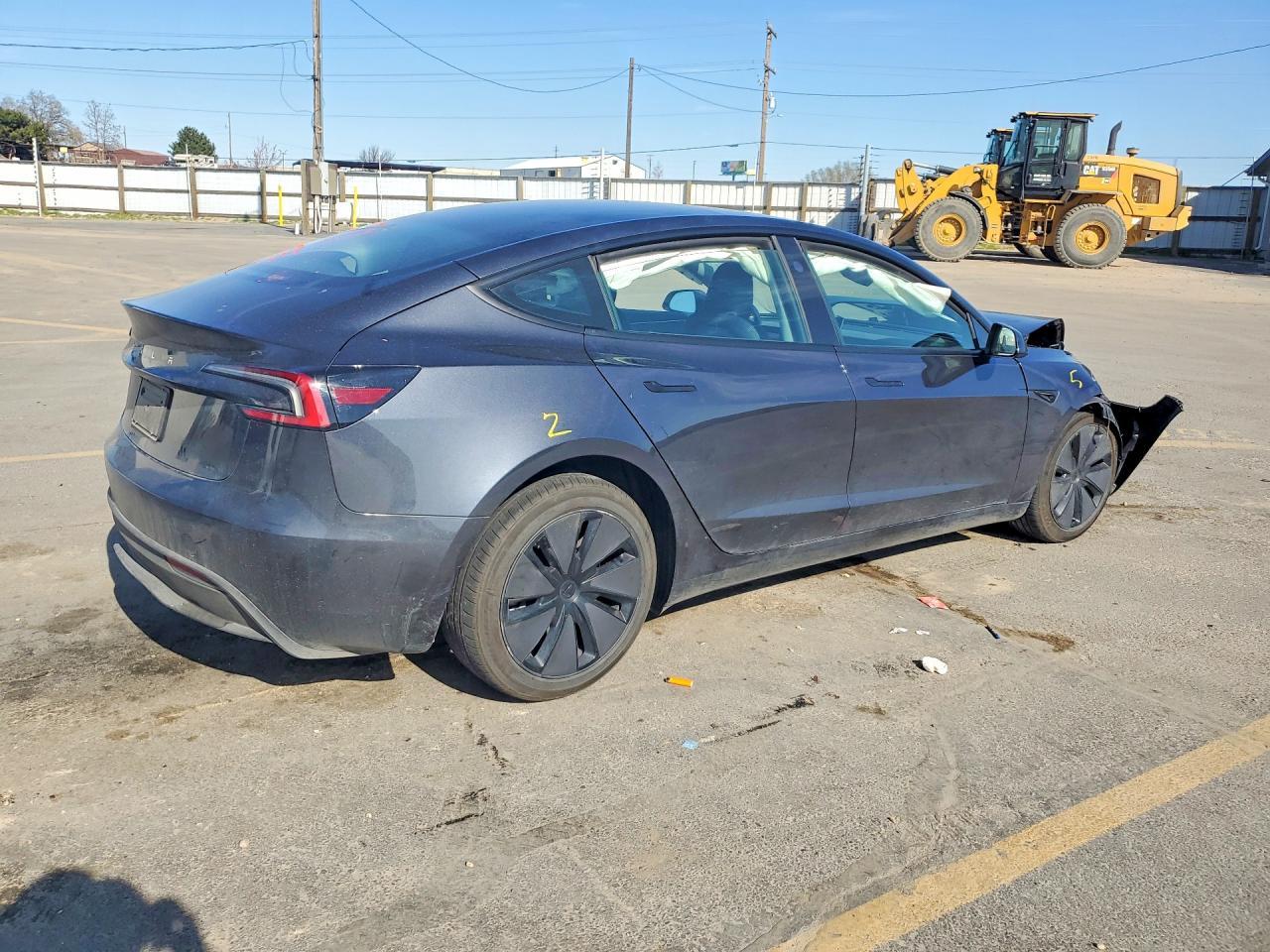 2025 Tesla Model 3 - Фото 3